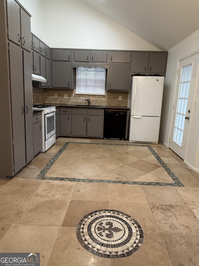 kitchen featuring sink, white appliances, gray cabinets, and decorative backsplash