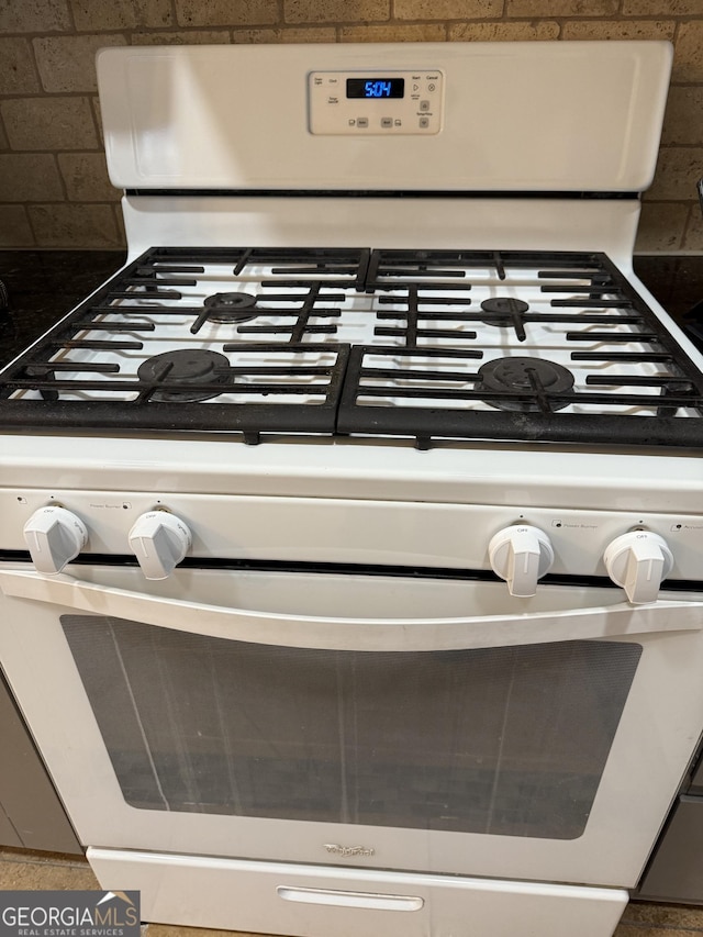 details featuring white gas range oven