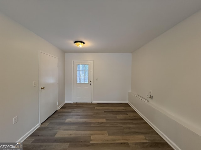 doorway to outside featuring dark hardwood / wood-style flooring