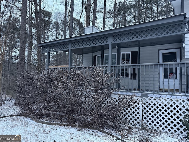 view of snow covered property