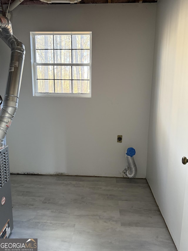 clothes washing area featuring electric dryer hookup