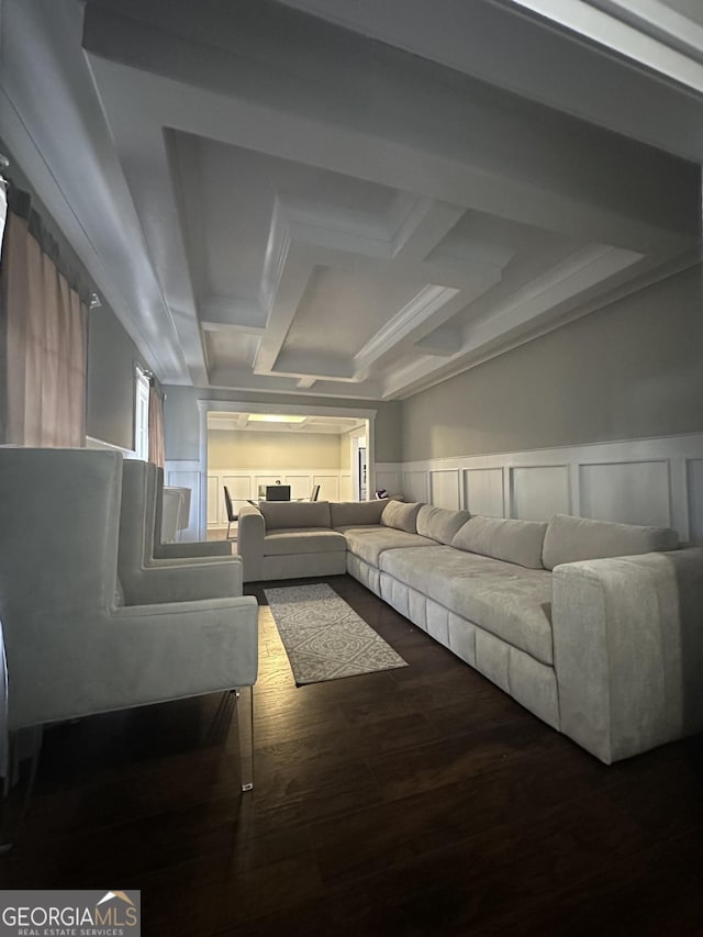 living room with wood-type flooring and crown molding