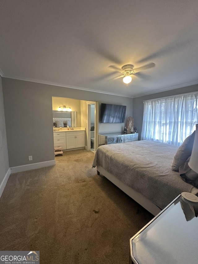 carpeted bedroom with crown molding and ceiling fan