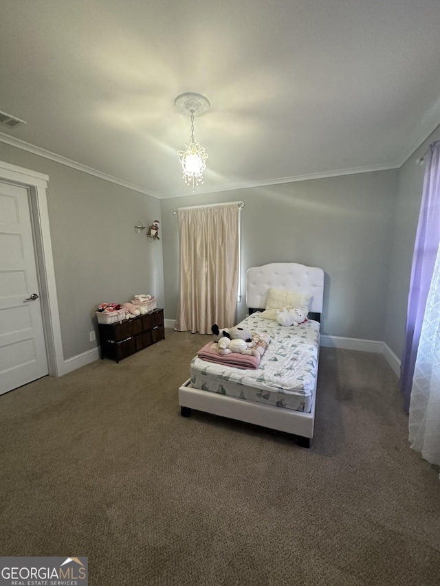 carpeted bedroom featuring crown molding and a chandelier