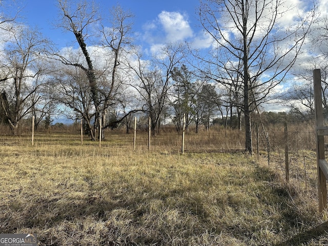 exterior space with a rural view