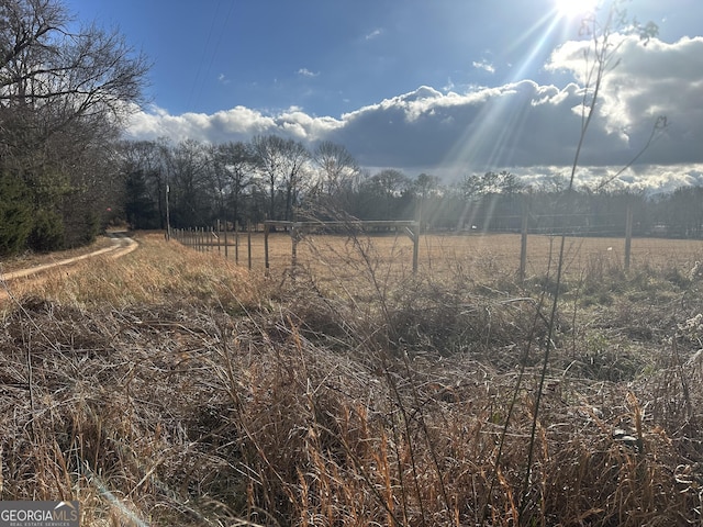 property view of mountains featuring a rural view