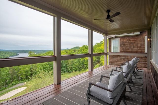 sunroom / solarium with ceiling fan