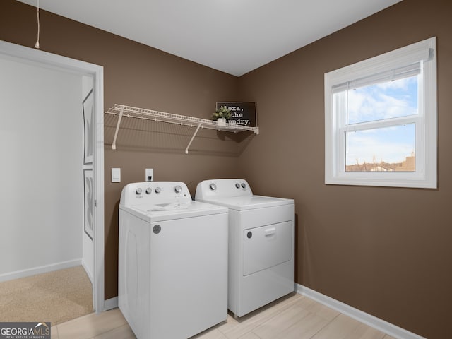 laundry area with washer and dryer