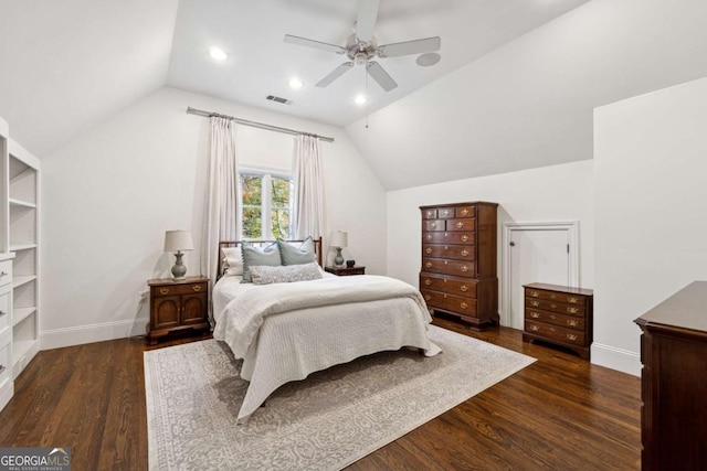 bedroom featuring lofted ceiling, dark wood-type flooring, and ceiling fan