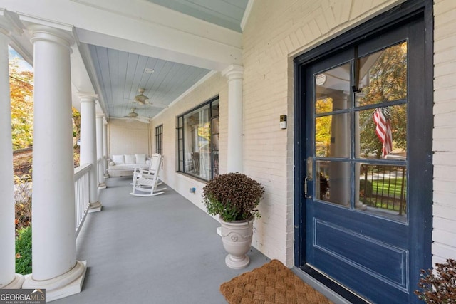 entrance to property featuring a porch