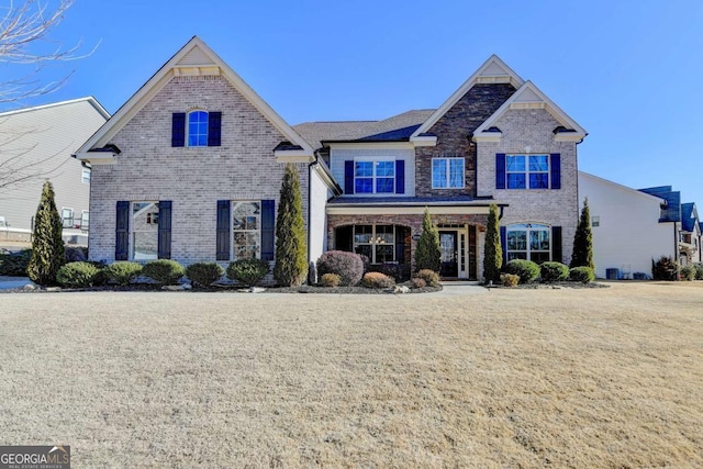 view of front of home with a front lawn