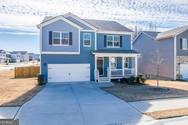463 Walnut Grove Way, Pendergrass, GA 30567 - view of front of home with a porch, a garage, driveway, and central air condition unit