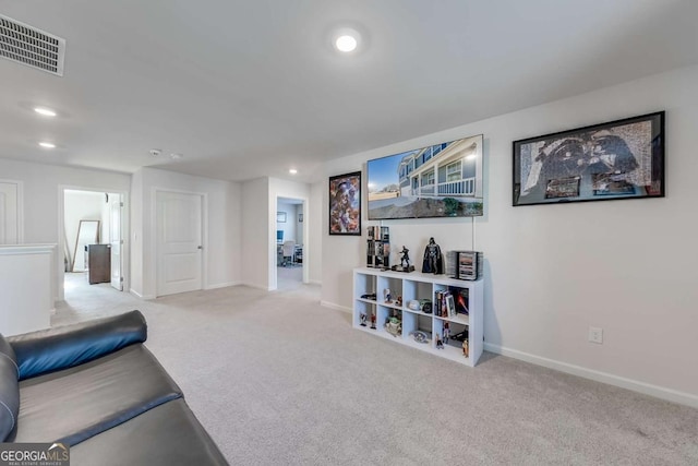 living room featuring light colored carpet