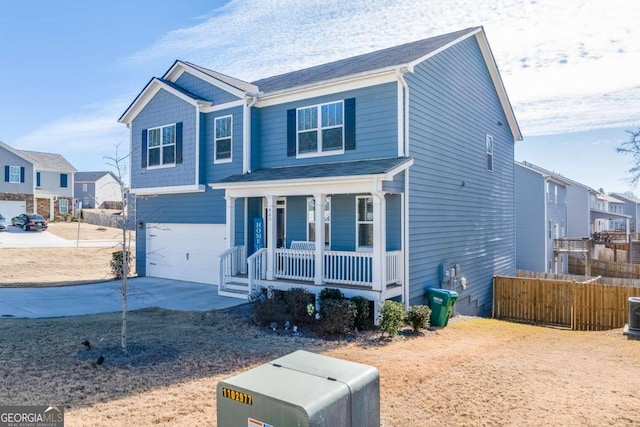 view of front of house featuring a porch and a garage