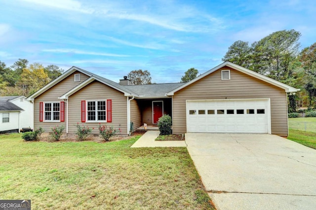 ranch-style home with a front yard and a garage