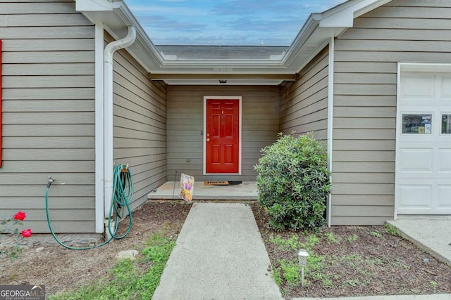 entrance to property with a garage