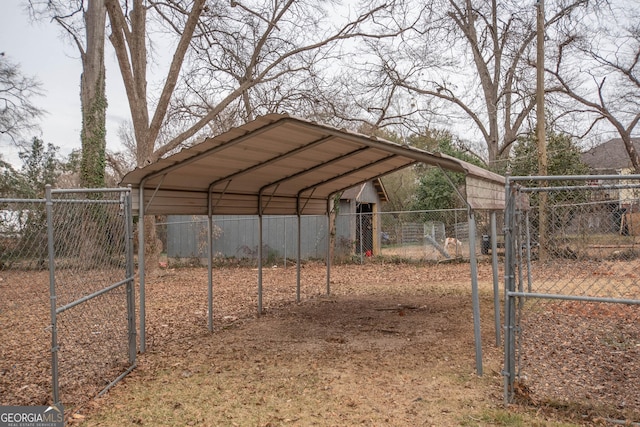 view of vehicle parking with a carport