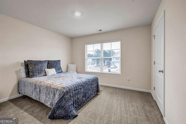 bedroom featuring carpet