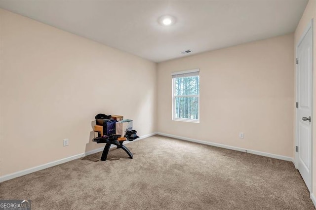 view of carpeted spare room