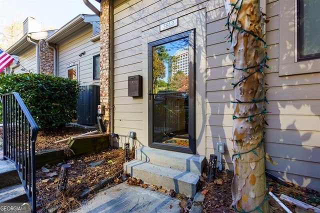 property entrance with central air condition unit