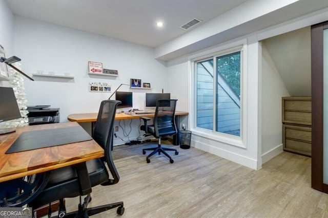 office space featuring light hardwood / wood-style flooring