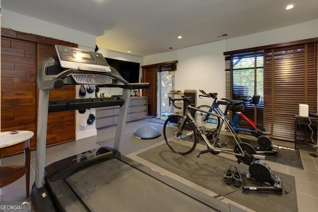 workout area with wooden walls