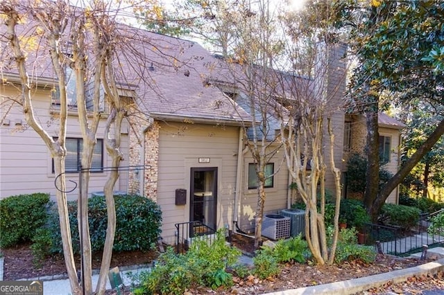 view of front of property with central AC unit