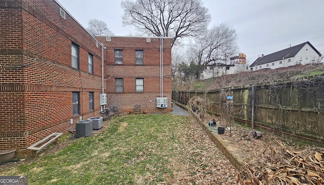 view of yard featuring central AC unit