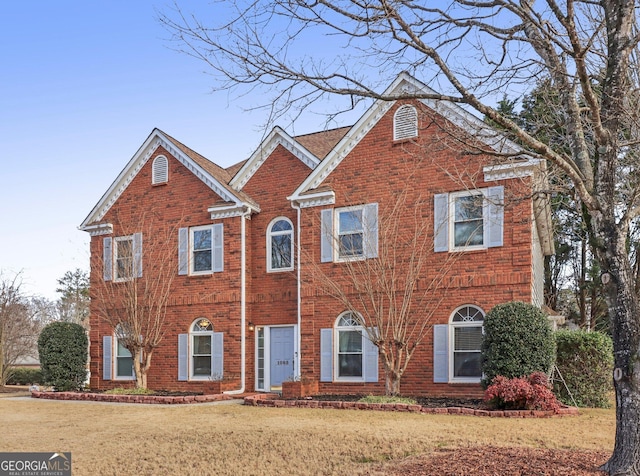 view of front of house with a front lawn