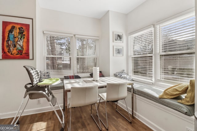 dining area featuring dark hardwood / wood-style flooring