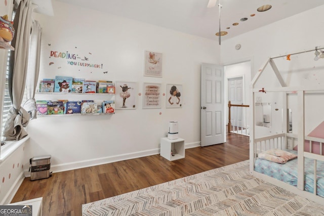 bedroom featuring hardwood / wood-style floors