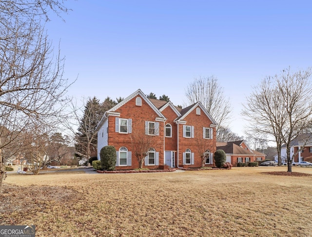 view of front of home featuring a front lawn