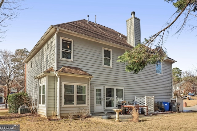 back of house featuring a patio area and cooling unit