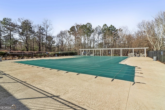 view of swimming pool with a pergola and a patio area