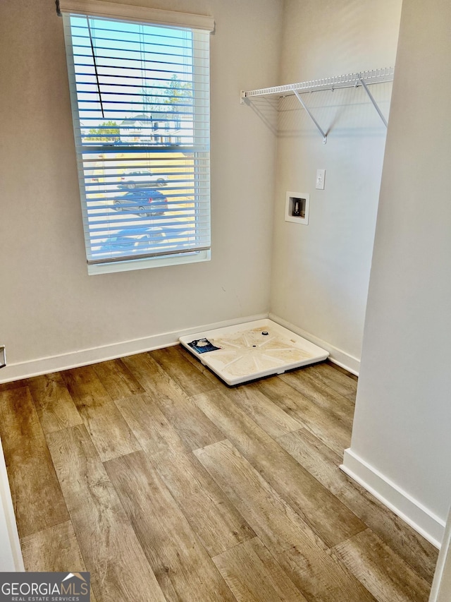 washroom featuring washer hookup and hardwood / wood-style floors