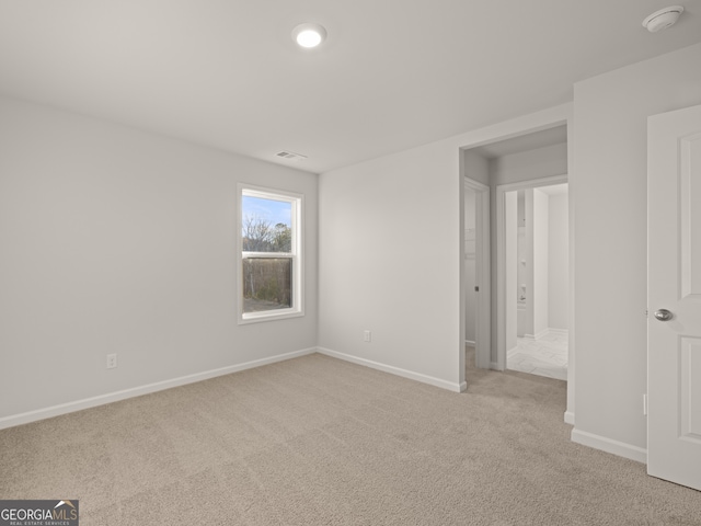 empty room with light carpet