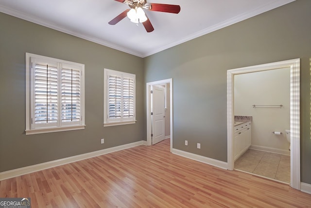 unfurnished bedroom with crown molding, connected bathroom, ceiling fan, and light hardwood / wood-style floors