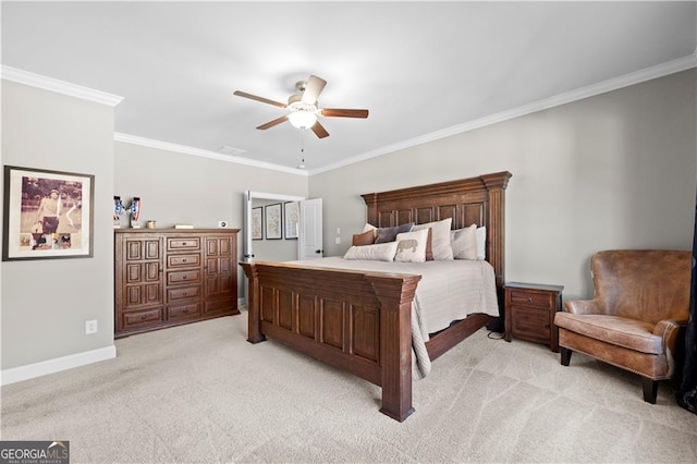 carpeted bedroom featuring ceiling fan and ornamental molding