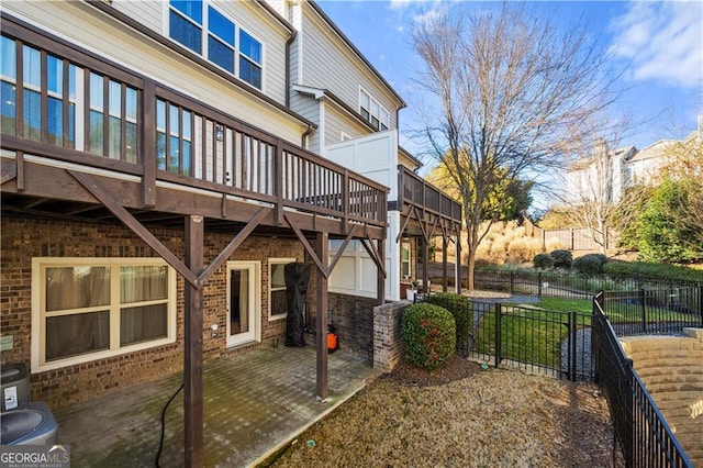 view of side of home featuring a patio