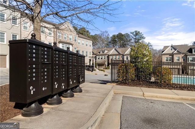 view of property's community with mail boxes