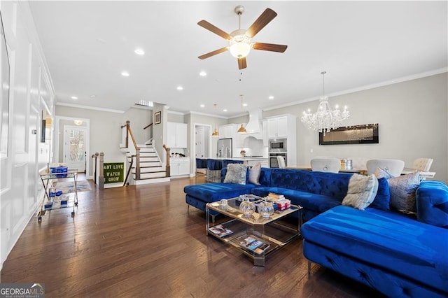 living room featuring crown molding, ceiling fan with notable chandelier, and dark hardwood / wood-style floors