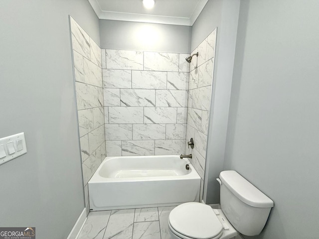 bathroom featuring tiled shower / bath combo, ornamental molding, and toilet