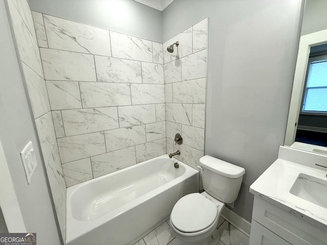 full bathroom featuring vanity, toilet, and tiled shower / bath