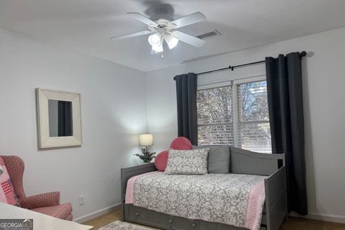 bedroom featuring ceiling fan