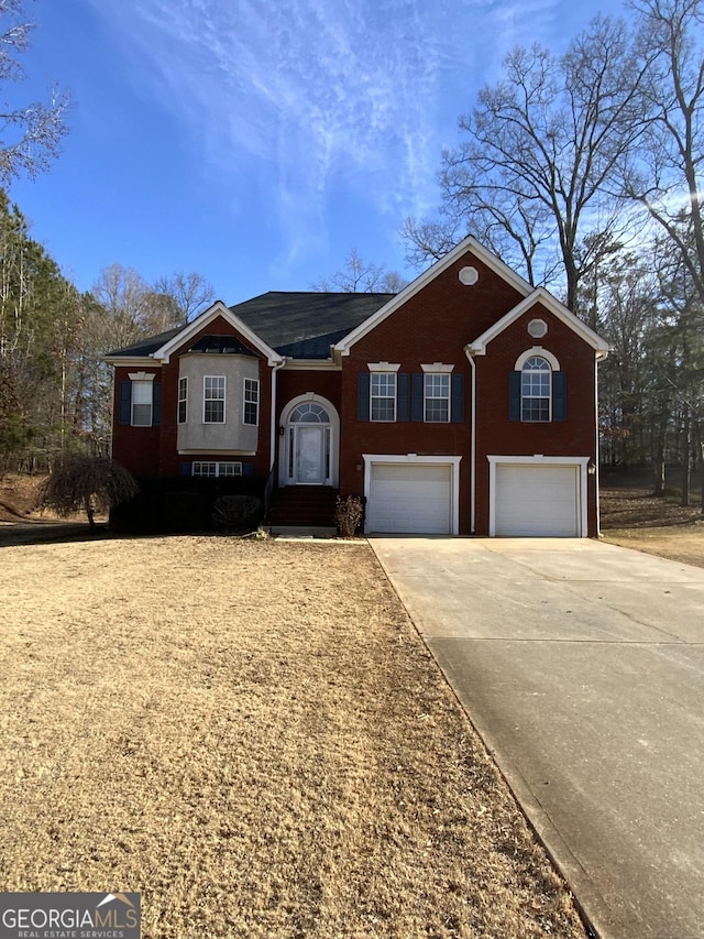 view of front of property featuring a garage