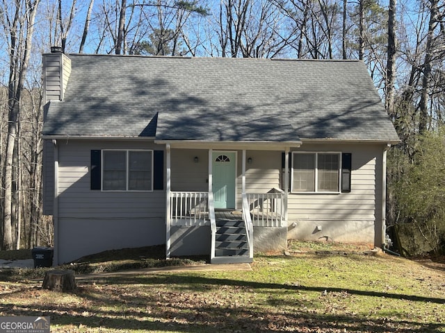 view of front of home featuring a front lawn