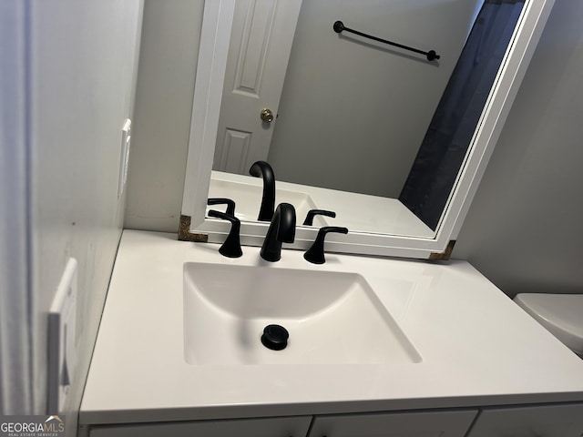 room details with vanity and toilet