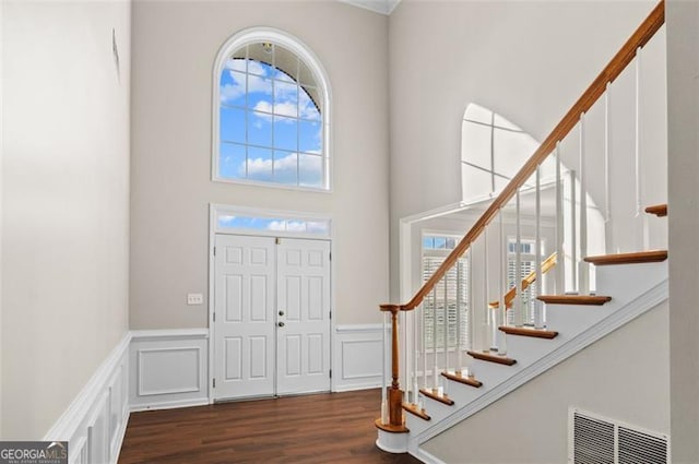 foyer entrance featuring dark hardwood / wood-style flooring