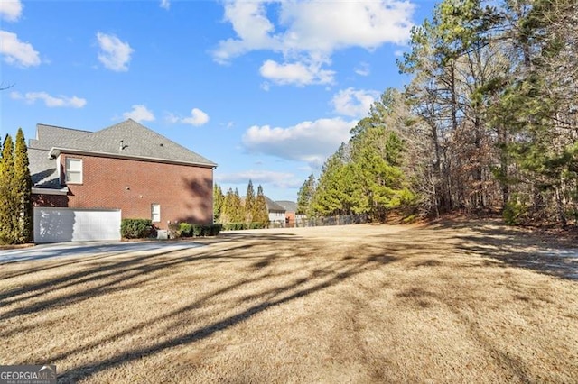 view of home's exterior with a lawn