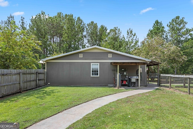 exterior space with a front yard